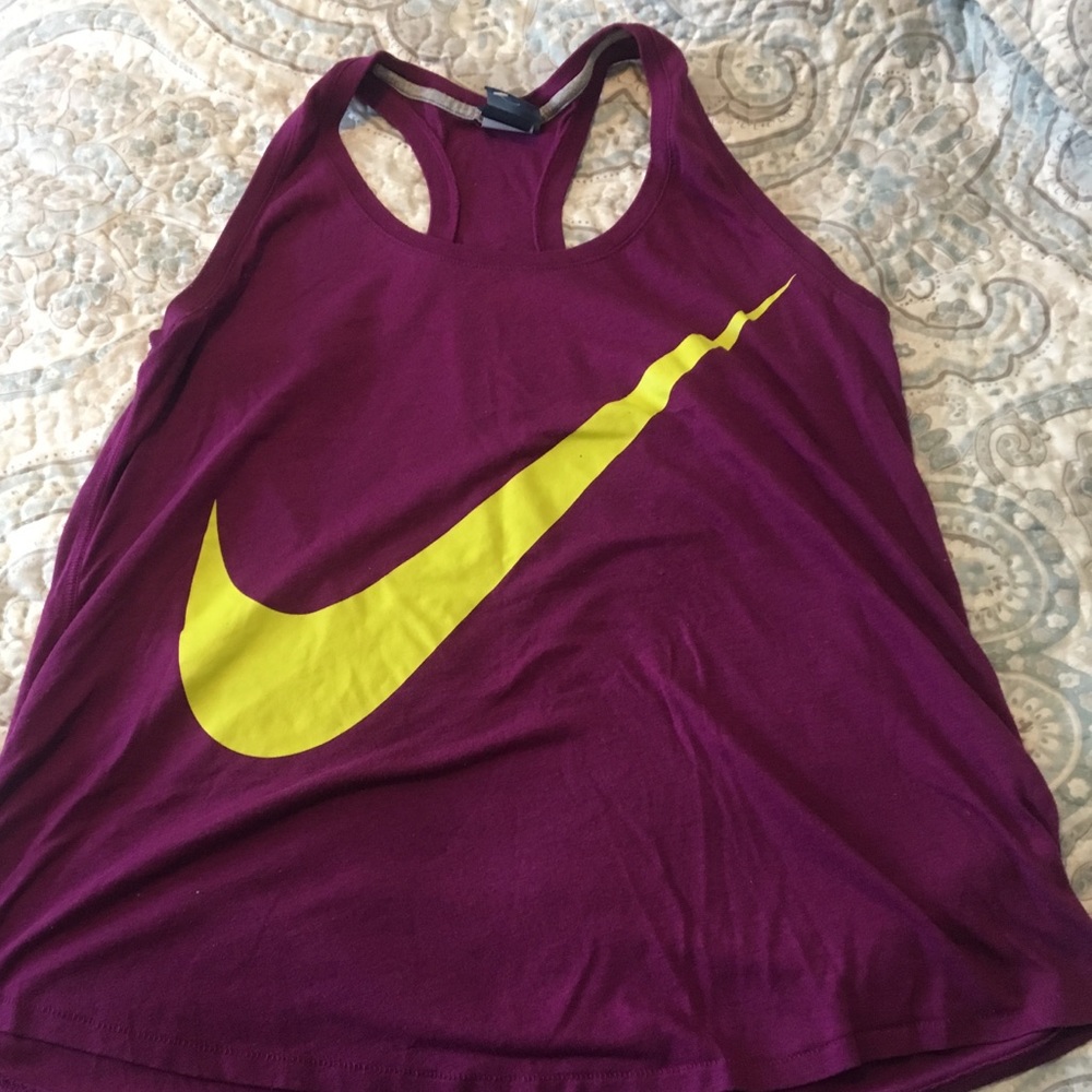 Nike purple top with bright swoosh